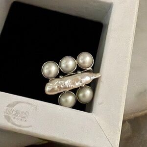 Unique Pearl and Silver ring w/oval freshwater pearl by Ann Taylor.